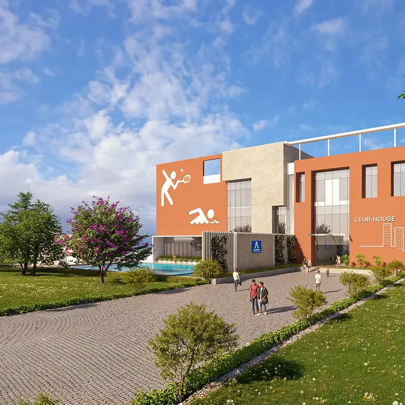Clubhouse of Aparna WonderWoods with a landscaped approach