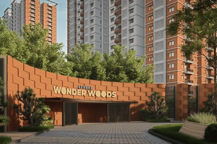 Entrance gate of Aparna WonderWoods with its sign